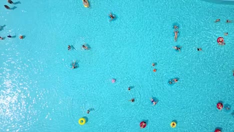 summer-day-famous-waterpark-outdoor-swimming-pool-aerial-down-view-panorama-4k