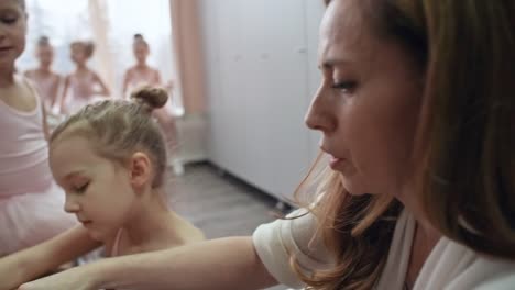 Helping-Girl-with-Ballet-Shoes