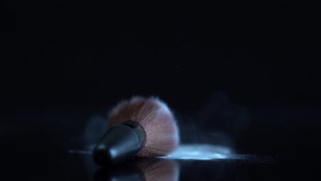 Powder-brush-fall-slow-motion-on-the-black-background.