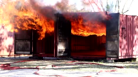 Fire-and-rescue-training-school-regularly-to-get-ready.-Storage-container-on-fire