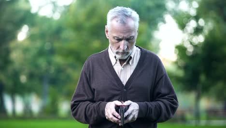 Sad-pensioner-holding-empty-wallet,-retirement-poverty,-financial-crisis,-credit