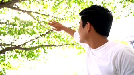 Young-man-walking-outside-the-home