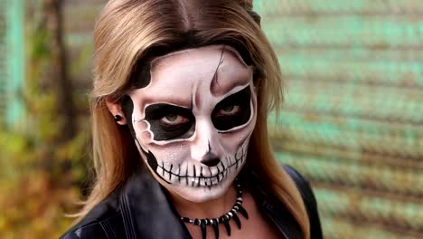 Close-up-portrait-of-a-gothic-girl-in-a-wedding-dress-and-a-creepy-make-up.