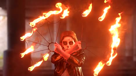 Creepy-bride-with-makeup-on-her-face-holding-burning-torches.