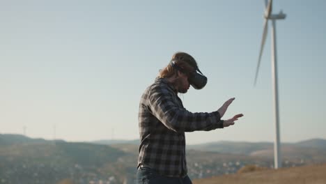 Man-using-virtual-reality-glasses.-Virtual-reality-game.-Man-working-using-modern-VR-glasses.-Bearded-man-uses-VR-headset-display-with-headphones-for-virtual-reality-game.