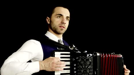 Close-up.-A-musician-in-a-white-shirt-plays-the-accordion.