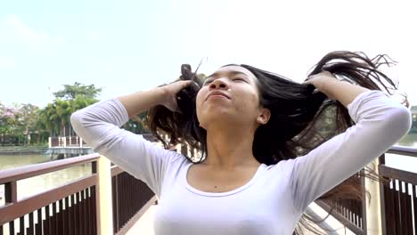 Slow-motion-of-Asian-woman-with-hair-motion.