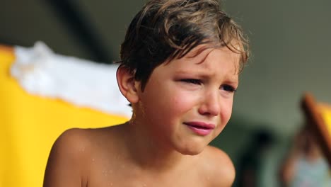 Weeping-child-with-a-sad-look-on-his-face