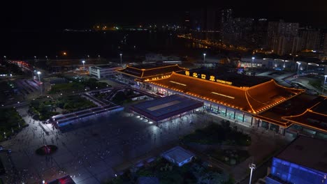 Zhuhai-Stadt-Nacht-beleuchtet-Grenze-Hafen-auf-dem-Dach-Panorama-4k-china