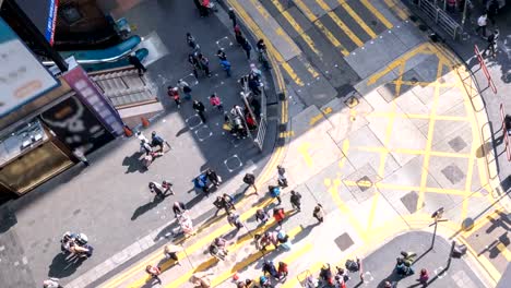 Draufsicht-Zeitraffer-von-Menschen-auf-der-Straße-in-Hongkong-Kreuzung.