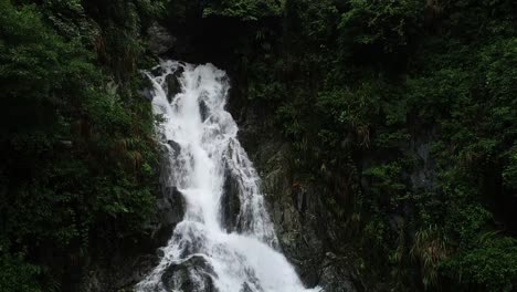 Aerial-View-of-Waterfall-in-the-Tropical-Rainforest-Mountains