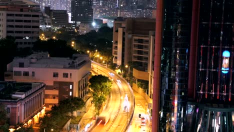 tiempo-lapso-Hong-Kong-ciudad-de-noche-con-luces-de-tráfico-y-elevadores