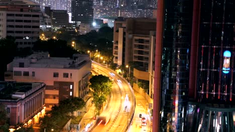 Zeit-Ablauf-beschäftigt-Hong-Kong-City-bei-Nacht-mit-Beleuchtung-von-Aufzügen-und-Verkehr