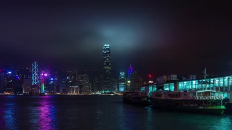 Finanzas-Internacional-luz-de-noche-centro-de-lapso-de-tiempo-de-4-k-de-hong-kong