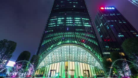 china-shenzhen-night-light-fountain-entrance-in-main-skyscraper-4k-time-lapse