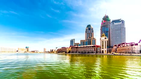 Time-lapse-of-Tianjin-cityscape,-sunny-sky-with-modern-buildings.-China