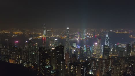 China-famosa-noche-iluminada-hong-kong-ciudad-Bahía-panorama-aéreo-4k