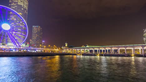 panorama-de-Bahía-luz-flyer-noche-China-hong-kong-city-4k-lapso-de-tiempo