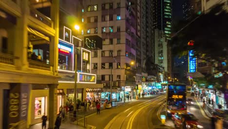 China-hong-kong-la-noche-ciudad-centro-tranvía-paseo-calle-panorama-4k-lapso-de-tiempo