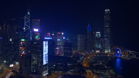 night-illumination-hong-kong-city-downtown-rooftop-panorama-4k-china