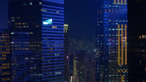 night-time-lights-hong-kong-downtown-bay-building-reflection-rooftop-panorama-4k-china