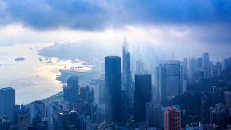 Aerial-Hong-Kong-Cityscape-On-Cloudy-Day-Over-4K-Time-Lapse-(pan-down)