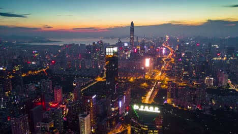 china-night-illumination-shenzhen-cityscape-downtown-KK100-building-aerial-panorama-4k-timelapse