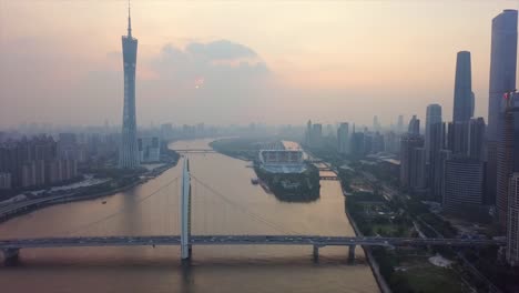 sunset-sky-guangzhou-city-canton-tower-liede-bridge-river-island-aerial-panorama-4k-china