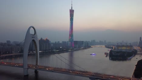 Sonnenuntergang-Guangzhou-Stadt-Kanton-Turm-Liede-Brücke-Fluss-Insel-aerial-Panorama-4k-china