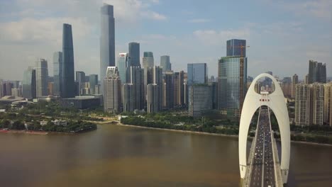 día-tiempo-guangzhou-ciudad-tráfico-liede-Puente-Río-Perla-china-de-panorama-aéreo-centro-4k