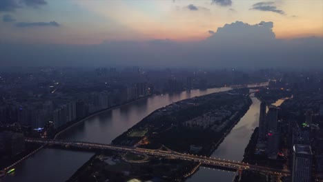 Guangzhou-Sonnenuntergangszeit-Perlfluss-Haixinsha-Insel-Innenstadt-Teil-Luftbild-Panorama-4k-china