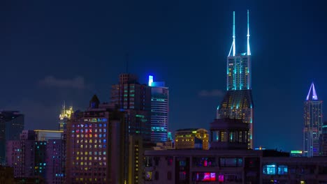 night-illumination-shanghai-cityscape-downtown-rooftop-4k-timelapse-china