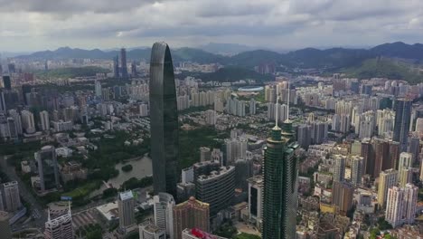 China-día-tiempo-shenzhen-paisaje-urbano-edificios-famosos-aérea-panorama-4k