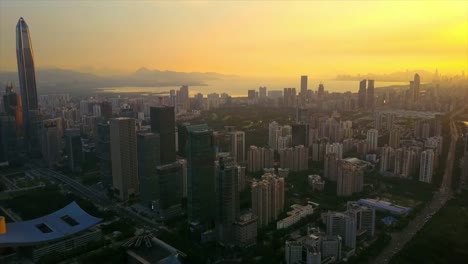 China-atardecer-shenzhen-construcción-centro-tráfico-carretera-aérea-panorama-4k