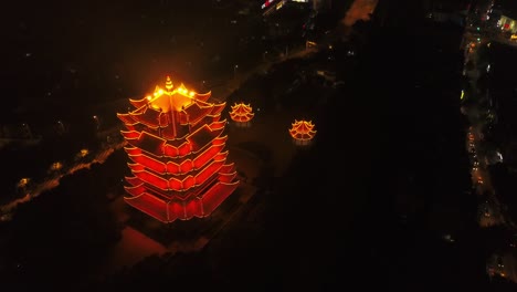 china-night-time-illumination-wuhan-city-famous-yellow-crane-temple-aerial-top-view-4k