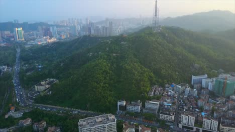 sunset-time-zhuhai-cityscape-famous-fisher-girl-monument-beach-bay-aerial-panorama-4k-china