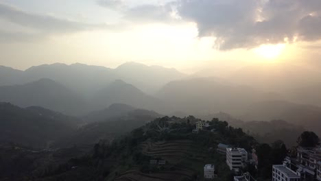 Sunset-above-valley-in-the-Himalaya-mountains,-Nepal