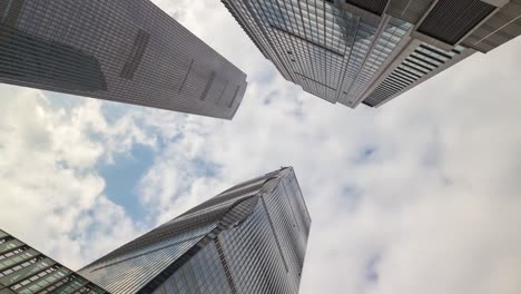 sunny-day-guangzhou-city-downtown-megatall-skyscrapers-up-view-4k-time-lapse-china