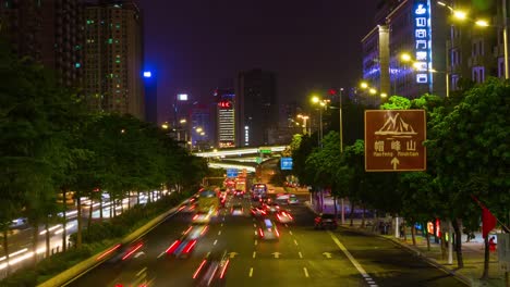 Guangzhou-ciudad-noche-tráfico-calle-cruce-puente-ve-4-china-de-lapso-de-tiempo-k