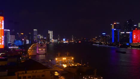 night-time-shanghai-city-riverside-dock-liner-rooftop-panorama-4k-china