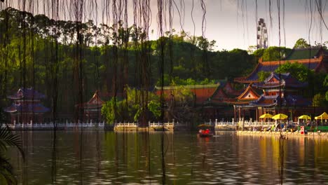 China-Sonnentag-Zhuhai-Stadt-berühmten-Park-See-Panorama-4k-Zeitraffer