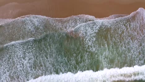 Aerial-top-view-of-Beach-with-ocean-waves,-natural-background