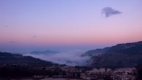 Sunset-sky-with-dynamic-color-change-and-cloud-movement-towards-sea-of-clouds