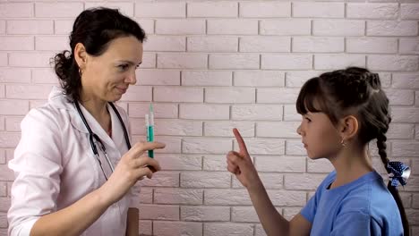 The-child-is-afraid-of-injecting-with-a-syringe