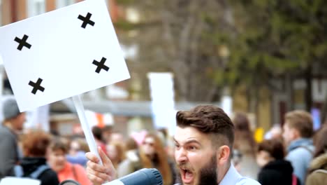 American-people-on-the-political-rally.-White-banner-with-tracking-markers.