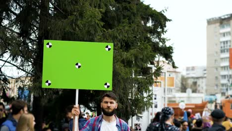 People-on-strike.-Police-on-the-background-of-a-talking-adult-young-20s-man-4k.