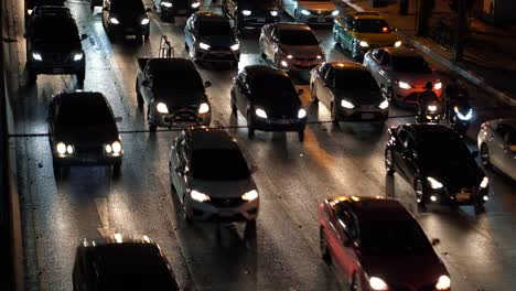 Cars-stopped-on-a-multi-lane-road-in-the-traffic-jam-at-night-time