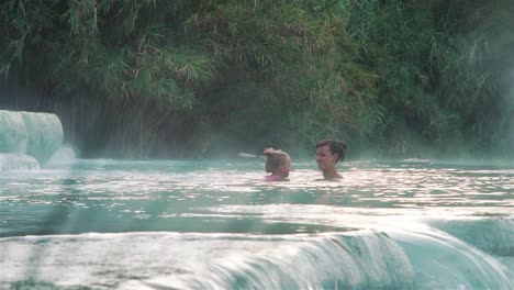 Little-Girl-and-Mother-Relaxing-in-a-Hot-Springs