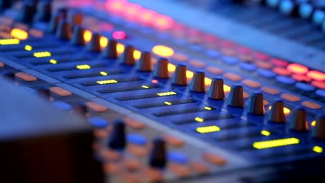 Audio-mixer-working-on-rock-concert