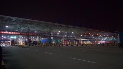 noche-iluminada-ciudad-de-shenzhen-tráfico-puerto-contenedor-terminal-entrada-panorama-4k-china